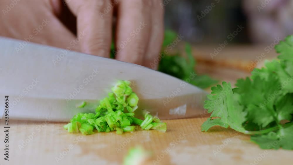 Coriander cutting table top close up Coriander cutting table top close up