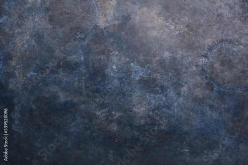 Rust and oxidized metal background. Old metal iron panel. Vintage abstract background with dim gray, dark gray and dark blue, brown colors and space for text or image.