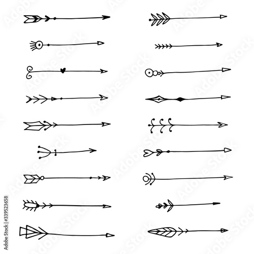 Arrows vector tribal boho style design elements. Hand drawn arrows and feather ethnic set
