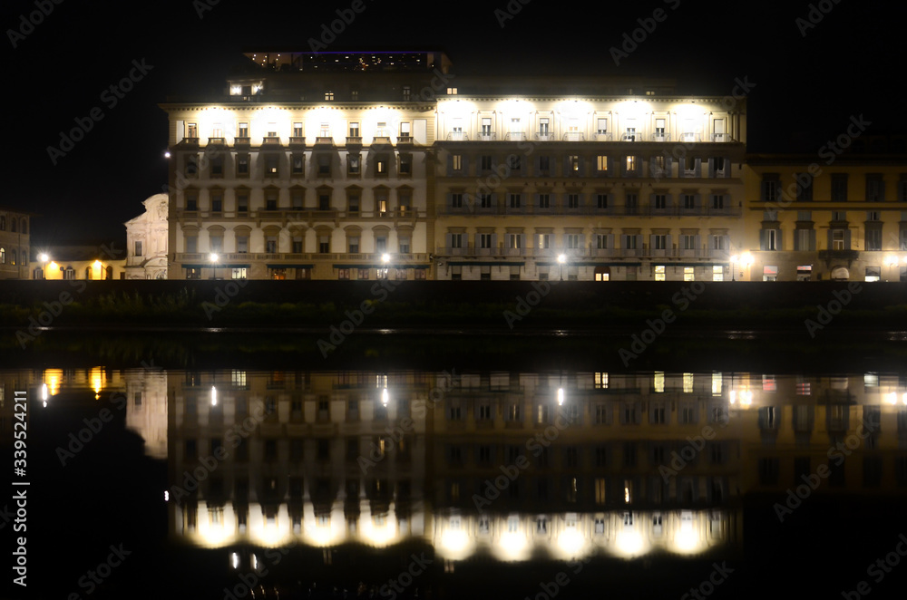 Naklejka premium Night view reflection old hotel Florence, Italy