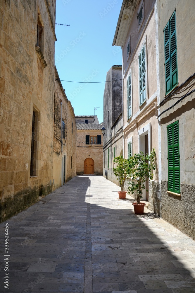 Alcudia, Mallorca, Spain. Alcudia Old Town medieval street and buildings