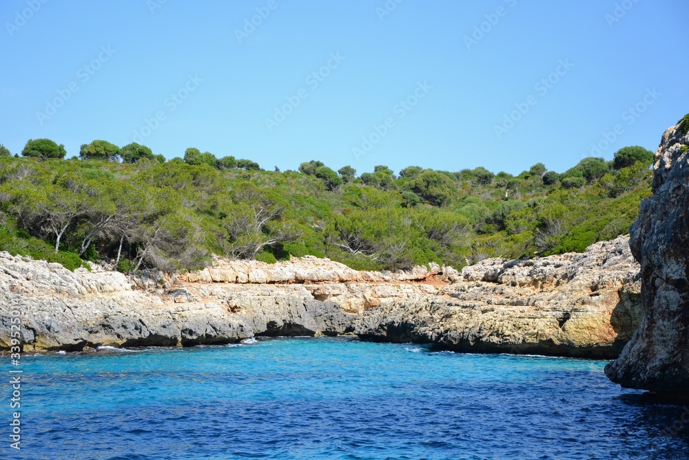 Beautiful coast of Mallorca/Majorca - Majorca coastline with caves in the rocks - view from the cruise ship, from the sea