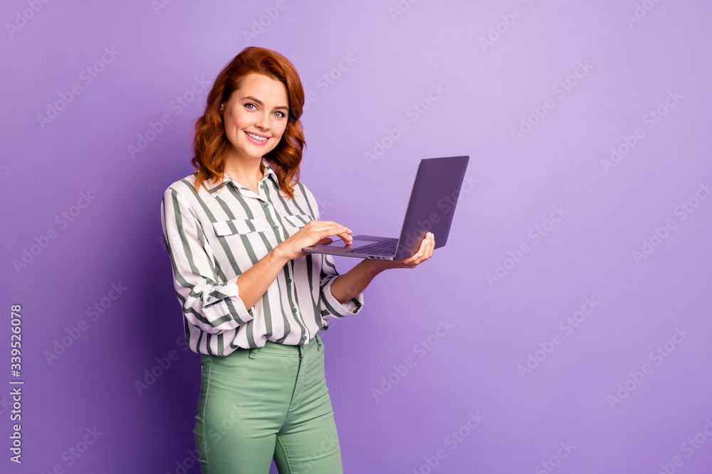 Portrait of confident positive cheerful woman have computer job using device texting searching information wear formalwear outfit isolated over violet color background Portrait of confident positive cheerful woman have computer job using device texting searching information wear formalwear outfit isolated over violet color background