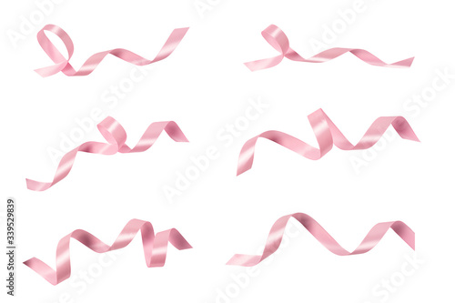 Obraz na plátně A pink ribbons isolated on a white background with clipping path.