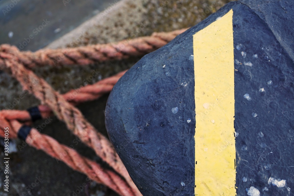 Stowage and bollard in maritime athmosphere