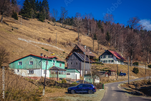 Buildings in Sokolec village located in Owl Mountains Landscape Park, Poland photo