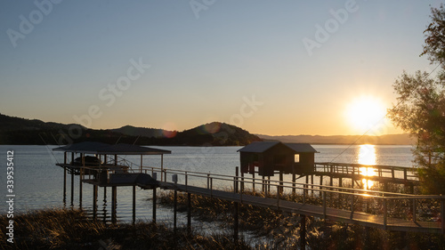 pier at Clare lake at sunset  california