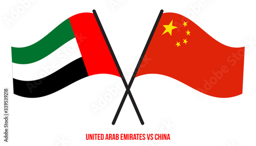 United Arab Emirates and China Flags Crossed And Waving Flat Style. Official Proportion