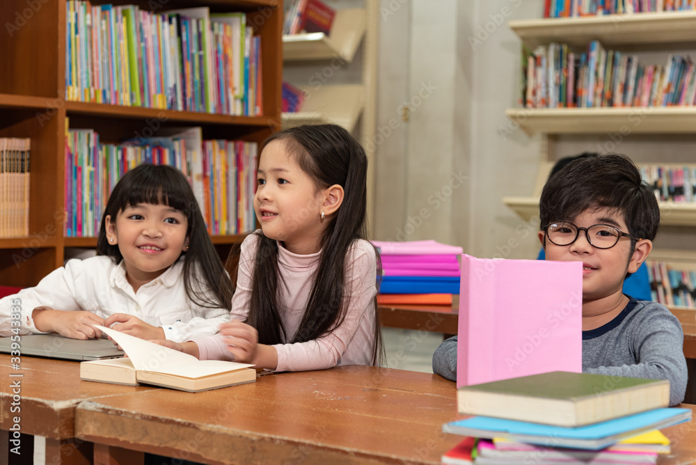 Education image,asian children happy learning in library at school. Education image,asian children happy learning in library at school.