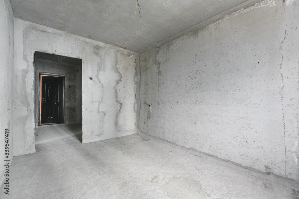 Obraz premium interior of the apartment without decoration in gray colors