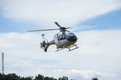 passenger helicopter flies at an air show