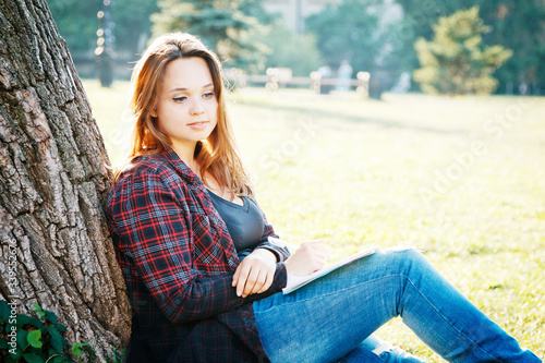 girl student near the tree