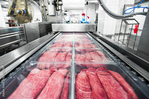 meat production - salami - packing line photo