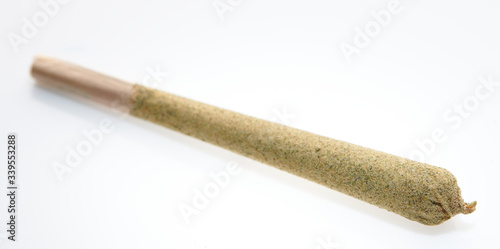 Alternative medicine close up on kief joint with marijuana  CBD white background