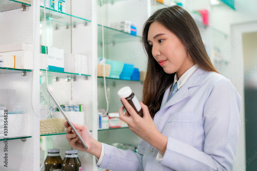 Asian woman pharmacy using video conference, make online consultation with patient consulting about illness and medication via video call. Telehealth, Telemedicine and online hospital.