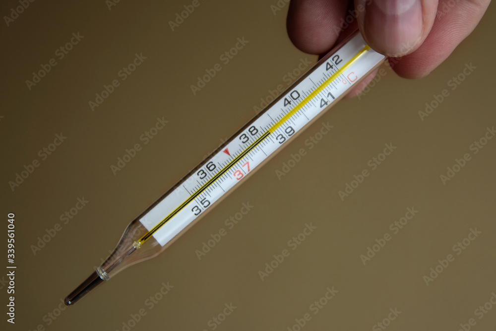 Thermometer, indicating a high temperature of 38. 8 degrees celsius. Thermometer, indicating a high temperature of 38. 8 degrees celsius.