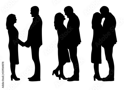 Three happy couple holding each other, kissing and looking in eyes.