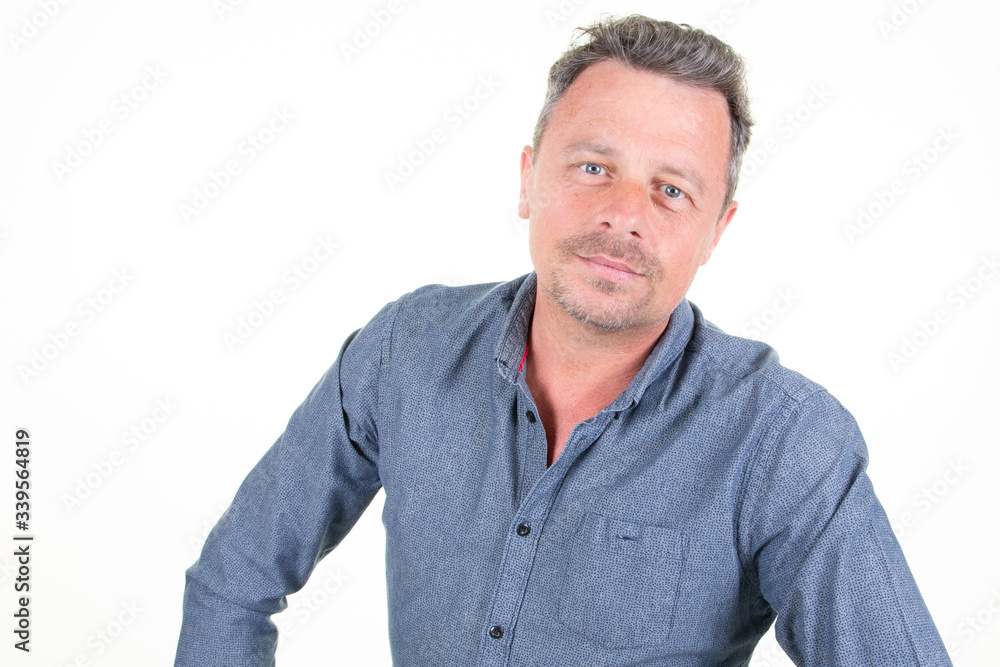Man handsome in blue shirt cheerful guy isolated on white background Man handsome in blue shirt cheerful guy isolated on white background