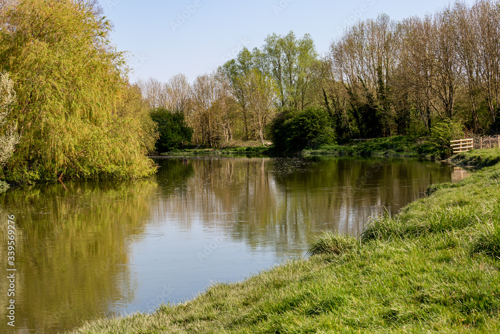 Looking along the River Ouse near Lewes on a sunny spring day Looking along the River Ouse near Lewes on a sunny spring day