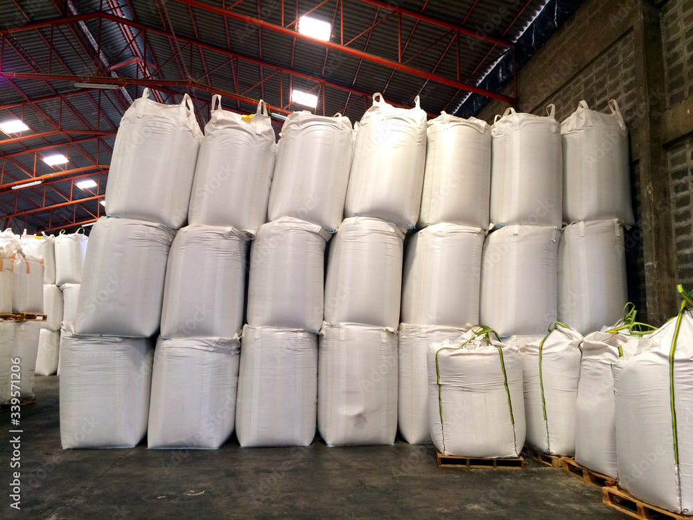 Stock pile jumbo-bag in warehouse waiting for shipment. Stock pile jumbo-bag in warehouse waiting for shipment.