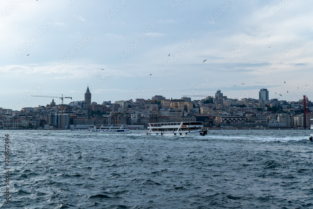 Ferry crossing The Bosphorus Strait in Istanbul, Turkey. July, 2019