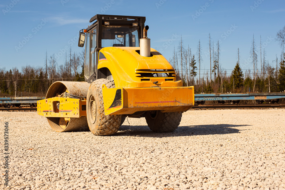 Fototapeta premium steamroller or soil compactor on construction works