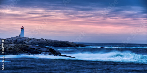 lighthouse on the coast at sunrise