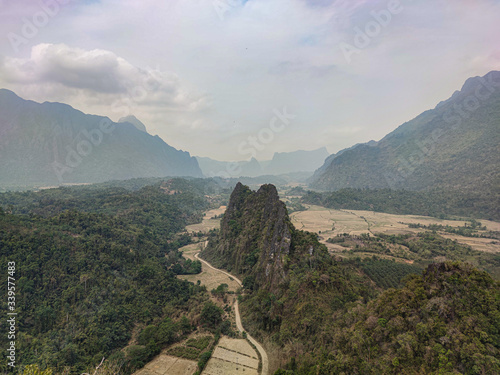 View of the green forest and rocks in the mountains.