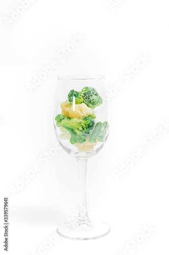 broccoli in a glass with onions