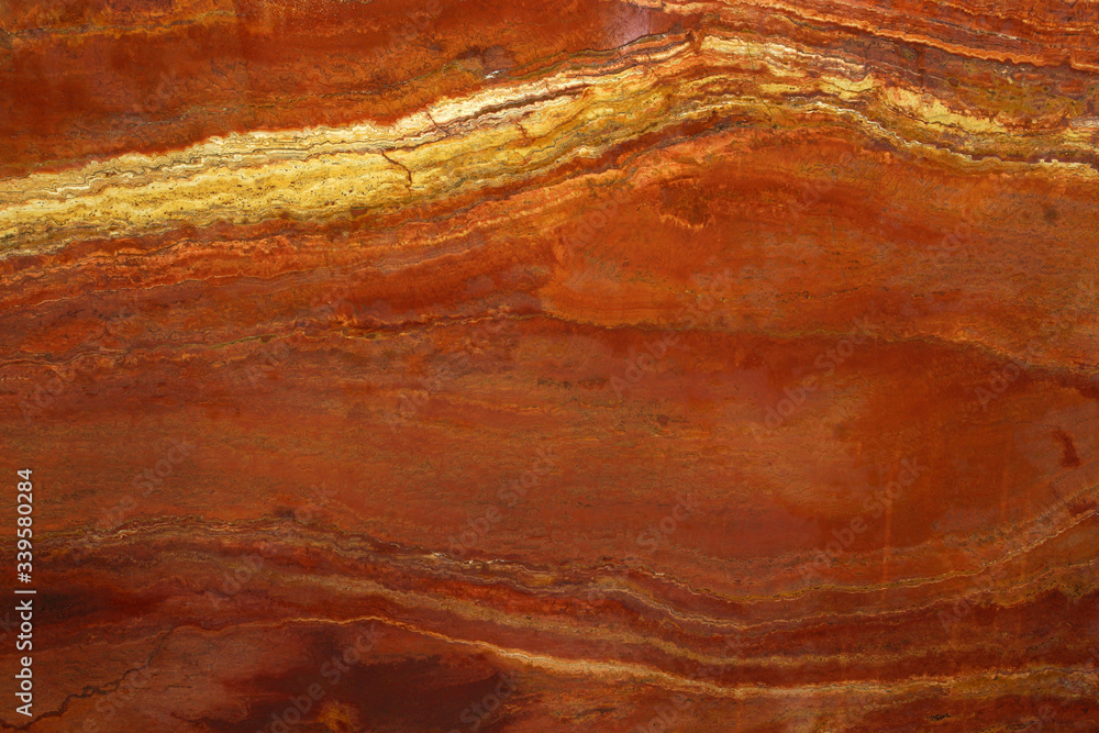 Background of natural stone in lush lava called Travertin Rosso Background of natural stone in lush lava called Travertin Rosso