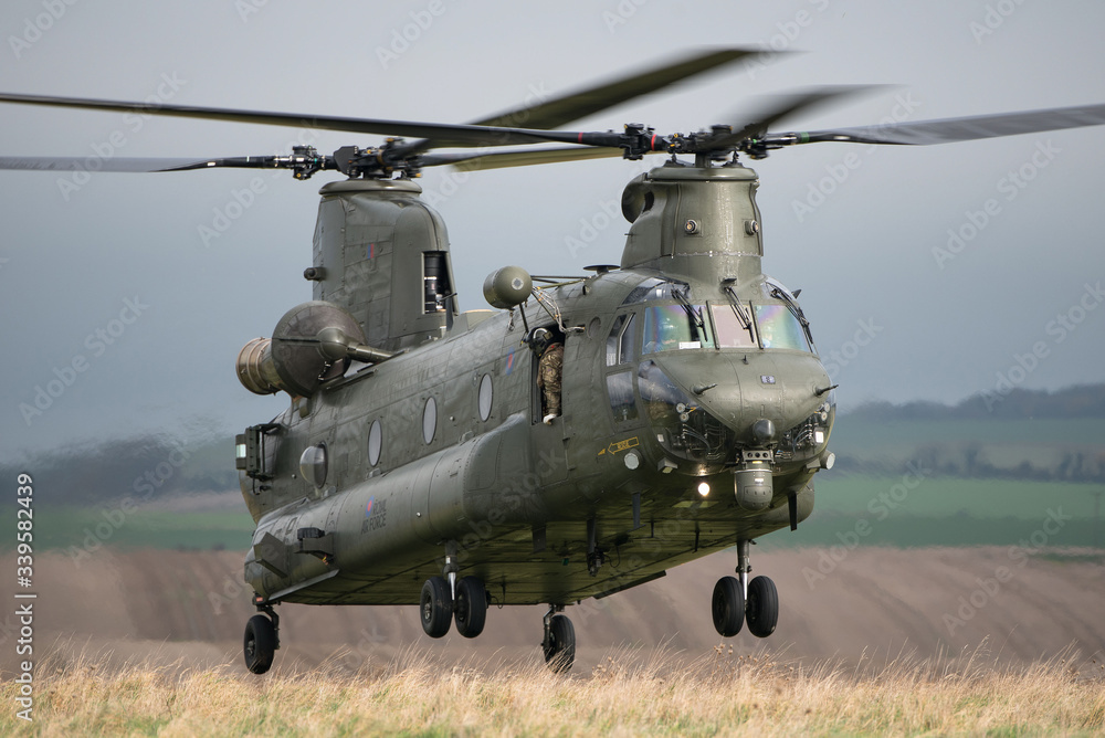 RAF Chinook helicopter on a training mission during Exercise Wessex Storm on Salisbury Plain Training Area, Wiltshire, UK