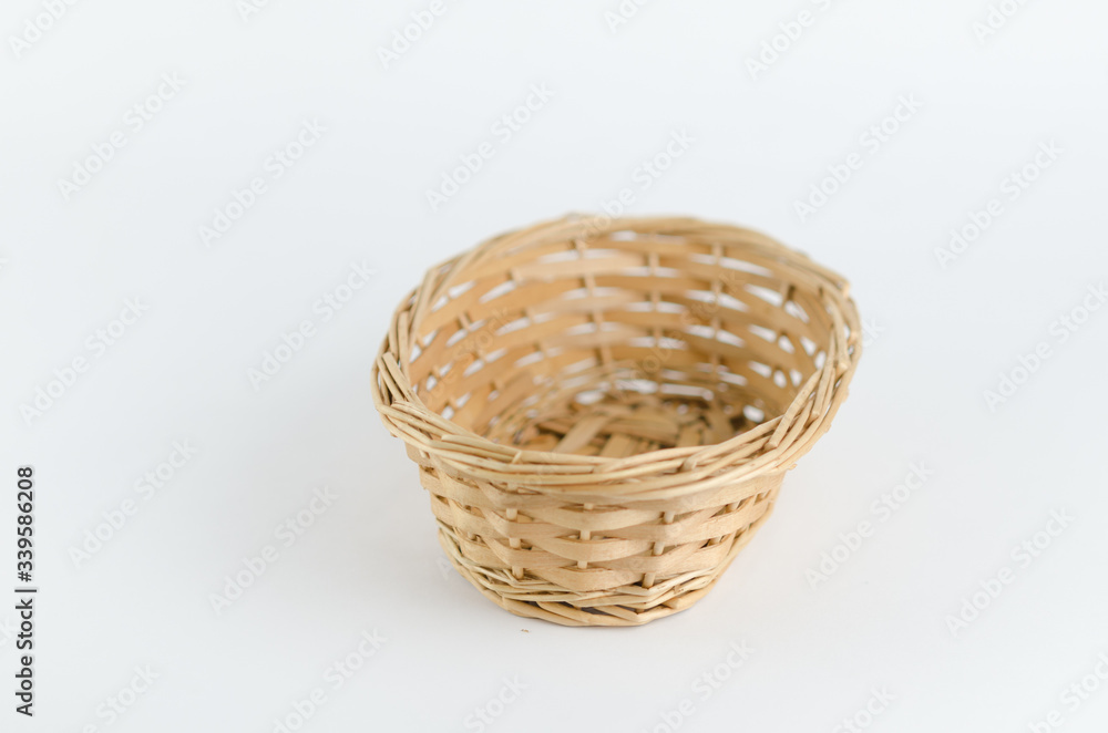 Empty wooden fruit or bread basket on white background Empty wooden fruit or bread basket on white background