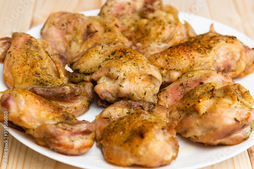 A plate of fresh, roasted chicken.