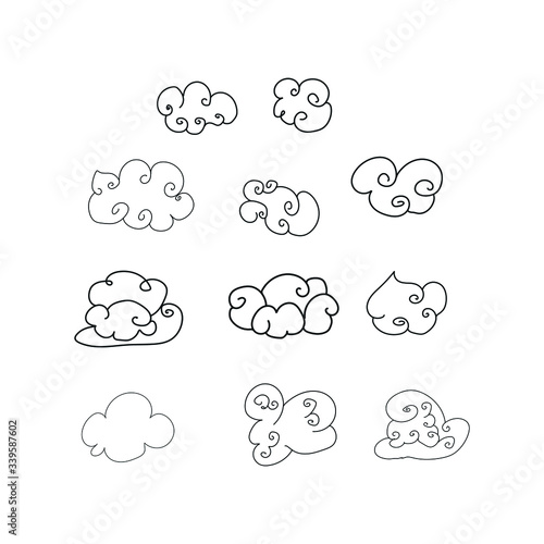 Hand Drawn Doodle Clouds Set,isolated clouds on white background. Vector Illustration. 