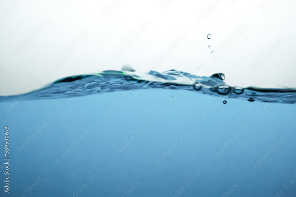 Wave and air bubbles on surface of water Wave and air bubbles on surface of water
