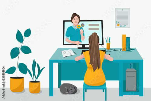 Remote home-based online training. A schoolgirl with a computer sits at a table in his house and listens to a school lesson. Vector flat illustration. The concept of individual and distance learning.