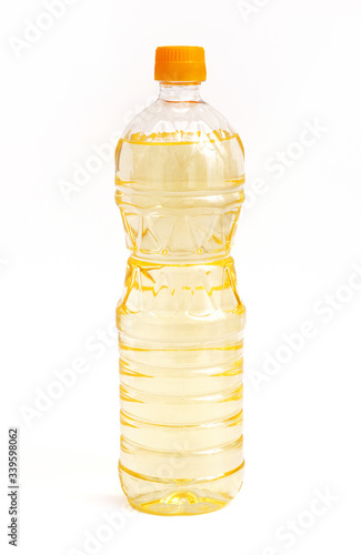 vegetable or sunflower oil in plastic bottle isolated on white background