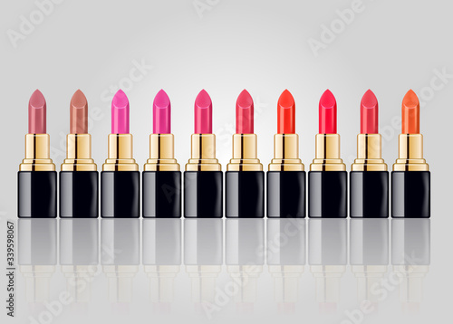 Vector realistic 3d set of colored lipstick. Red, pink, cream lipstick set isolated on white background with reflection