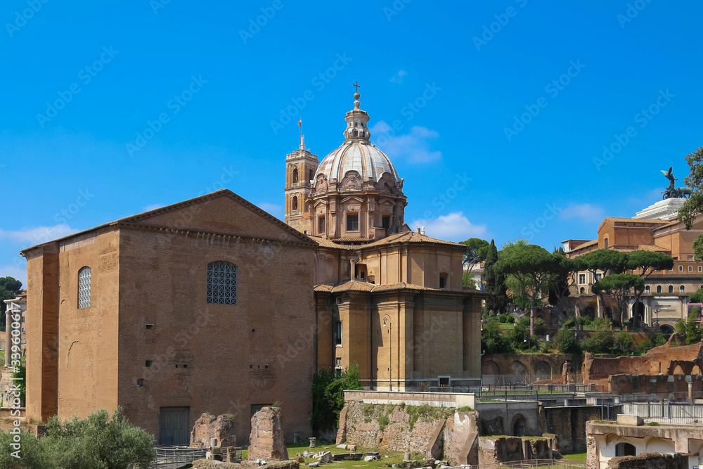 background view of antique ruins in the Roman Forum on Capitol Hill, Rome, Europe