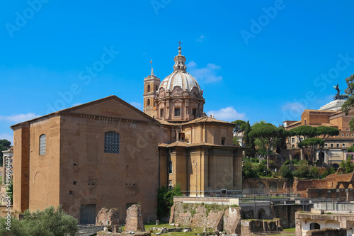 background view of antique ruins in the Roman Forum on Capitol Hill, Rome, Europe