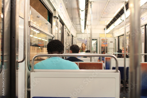 Canvas Print a black man in a metro in paris