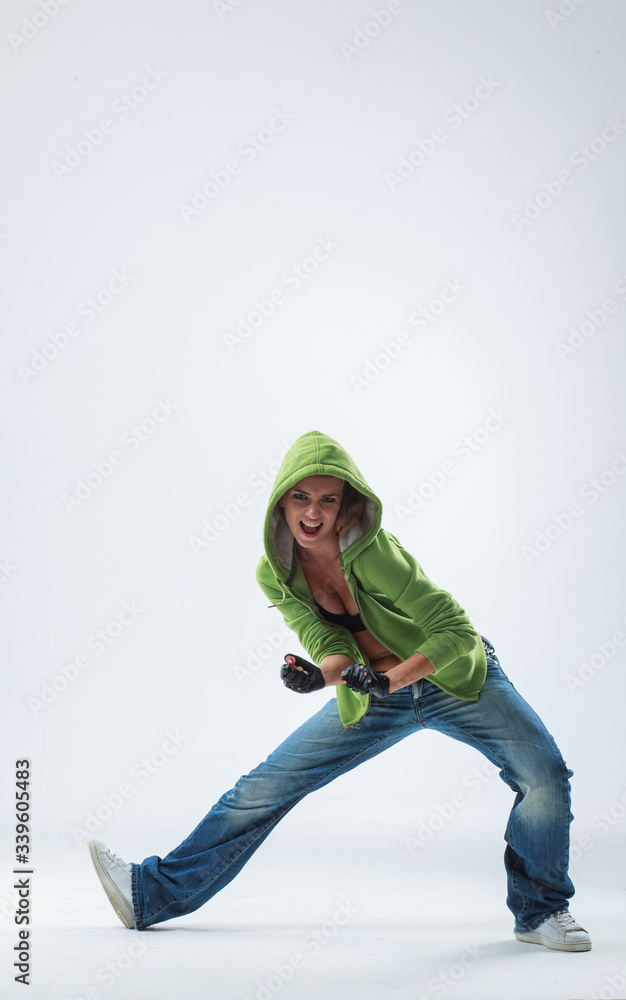 young woman jumping on studio backdrop young woman jumping on studio backdrop