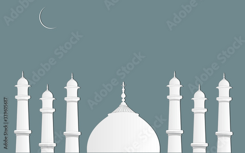 Eid greetings after the month of Ramadan for Muslim world using white masjid on dark background