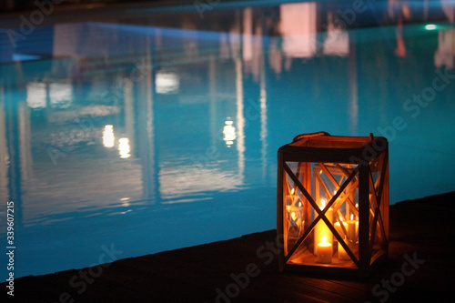 night swimming pool and candles