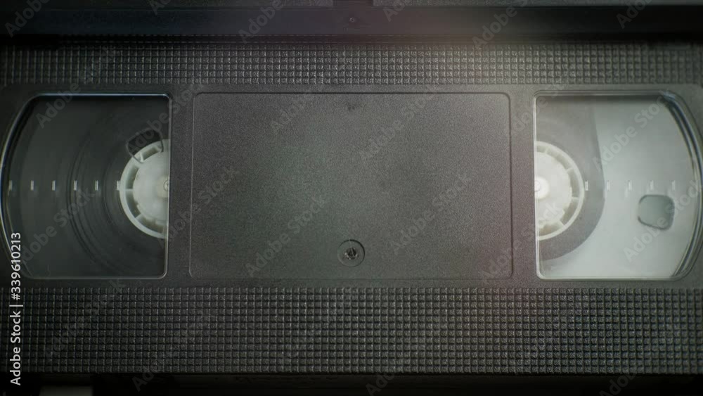 The mechanism for stopping and removing the VHS video cassette from the