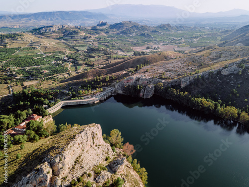 Aerial panoramic view of a water reservoir in the Mediterranean for times of drought.