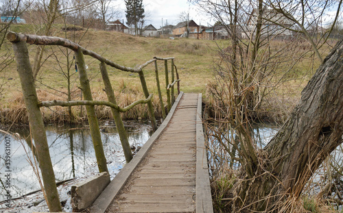 wooden bridge over the river