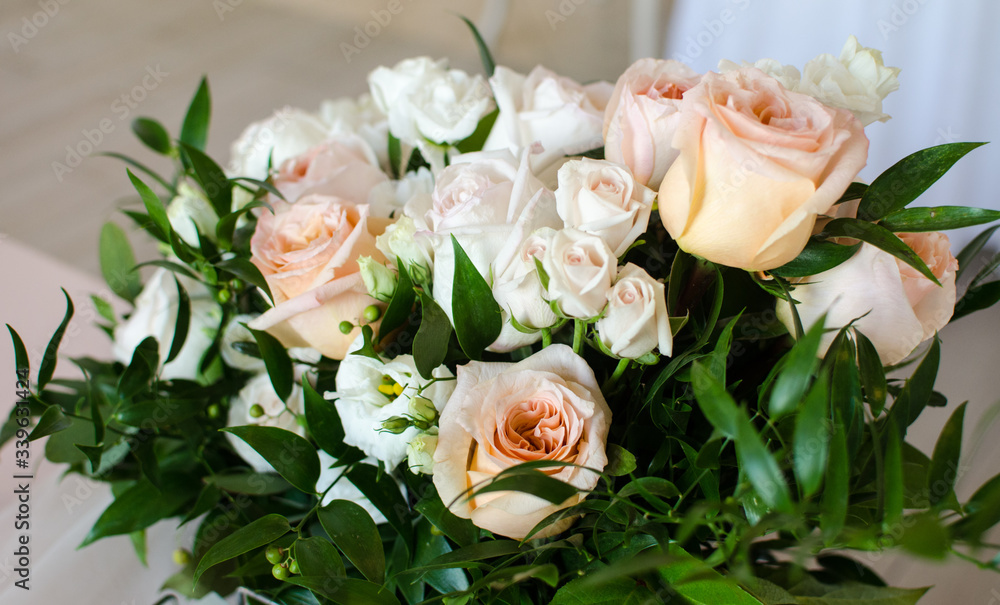 Fototapeta premium Table for wedding with white ang light pink flowers in restaraunt 