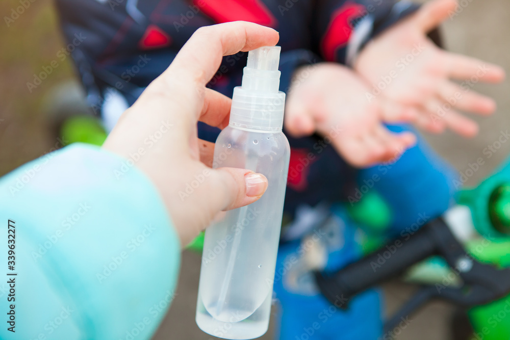 disinfection of hands and vehicles while cycling on the street. Sanitizer close-up. disinfection of hands and vehicles while cycling on the street. Sanitizer close-up.