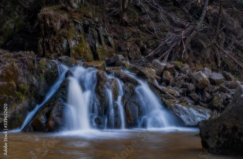 Kamyanka waterfall in Ukrainian Carpathian mountains. Long exposure shot  april 2020